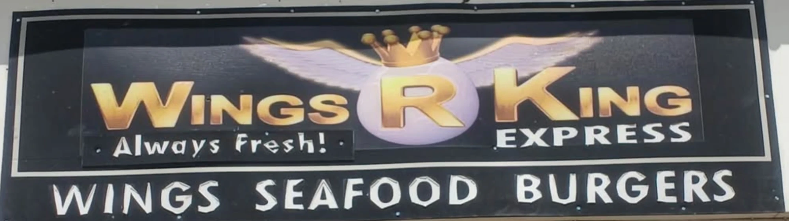 The Wings R King Express sign: Always Fresh! Wings, Seafood, Burgers